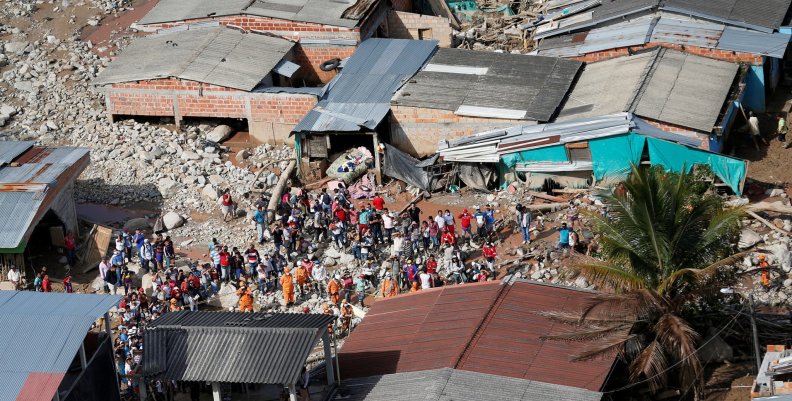 Aerial view of a neighborhood destroyed after flooding and mudslides caused by heavy rains leading several rivers to overflow, pushing sediment and rocks into buildings and roads, in Mocoa Aerial view of a neighborhood destroyed after flooding and mudslides caused by heavy rains leading several rivers to overflow, pushing sediment and rocks into buildings and roads, in Mocoa