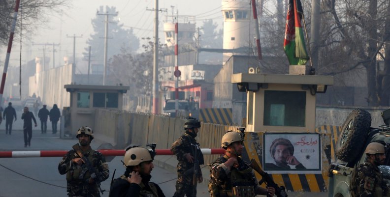 Afghan security forces keep watch at a check point close to compound of Afghanistan's national intelligence agency in Kabul, Afghanistan Afghan security forces keep watch at a check point close to compound of Afghanistan's national intelligence agency in Kabul, Afghanistan