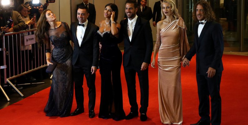 Argentine soccer player Lionel Messi's former Barcelona FC teammates and their wives pose for photographers as they arrive at the wedding of Messi and Antonela Roccuzzo in Rosario Argentine soccer player Lionel Messi's former Barcelona FC teammates and their wives pose for photographers as they arrive at the wedding of Messi and Antonela Roccuzzo in Rosario