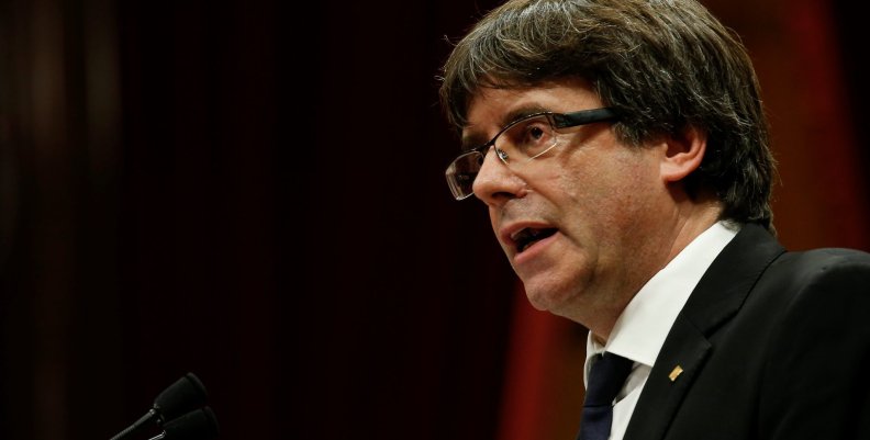 Catalan President Carles Puigdemont delivers a speech in the Catalan regional parliament in Barcelona Catalan President Carles Puigdemont delivers a speech in the Catalan regional parliament in Barcelona