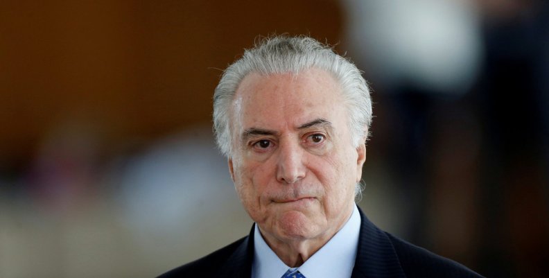 FILE PHOTO: Brazil's President Michel Temer reacts during breakfast with journalists at the Alvorada Palace in Brasilia FILE PHOTO: Brazil's President Michel Temer reacts during breakfast with journalists at the Alvorada Palace in Brasilia