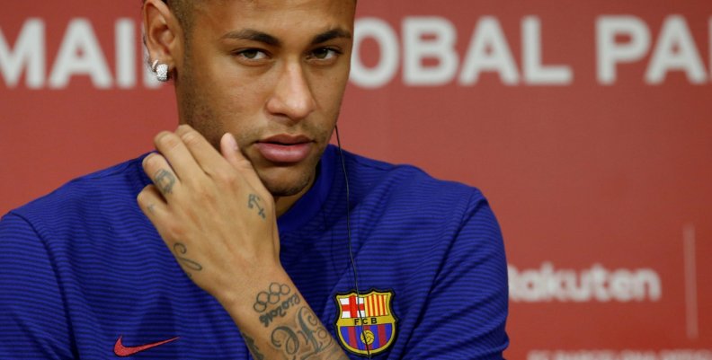 FILE PHOTO: FC Barcelona player Neymar attends a news conference in Tokyo FILE PHOTO: FC Barcelona player Neymar attends a news conference in Tokyo