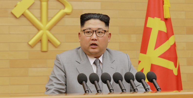 FILE PHOTO: KCNA picture of North Korea's leader Kim Jong Un speaking during a New Year's Day speech FILE PHOTO: KCNA picture of North Korea's leader Kim Jong Un speaking during a New Year's Day speech