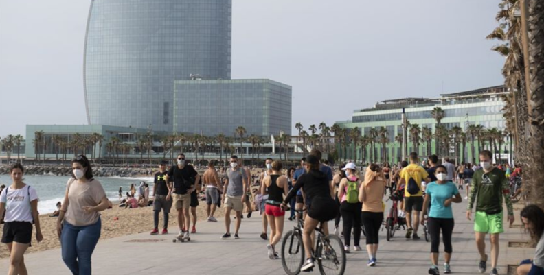 Personas en playa de España Personas en playa de España