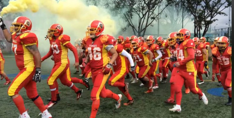Fútbol americano Equipo de fútbol americano de uniforme rojo