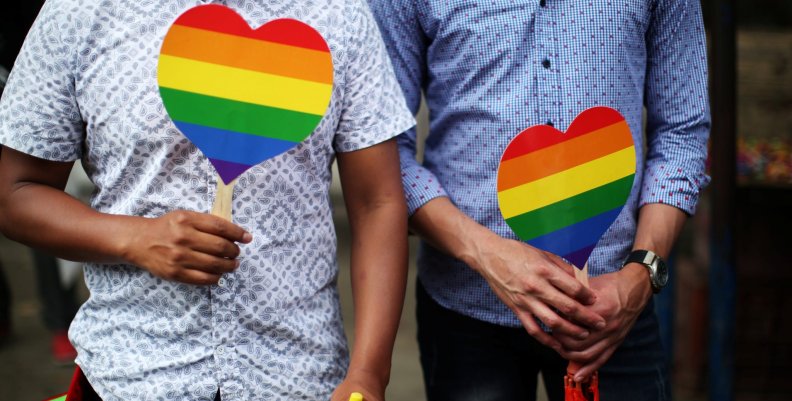 People attend the Gay Pride Parade in San Salvador People attend the Gay Pride Parade in San Salvador
