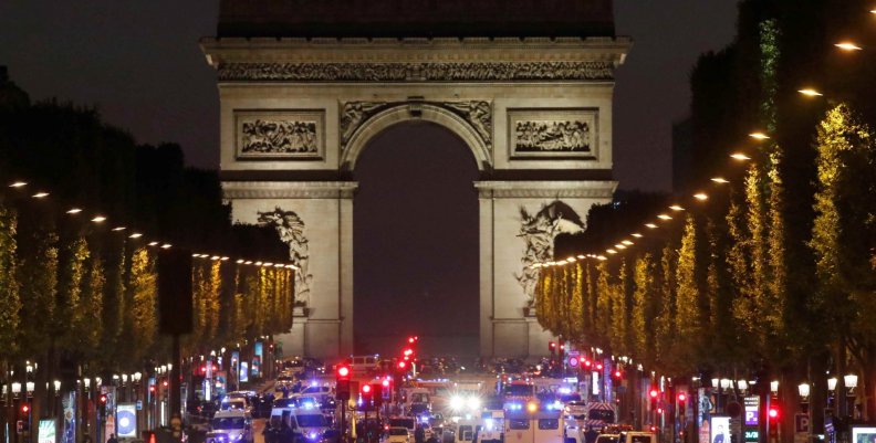 Police secure the Champs Elysees Avenue after one policeman was killed and another wounded in a shooting incident in Paris Police secure the Champs Elysees Avenue after one policeman was killed and another wounded in a shooting incident in Paris
