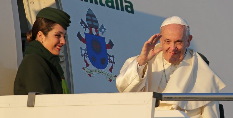 Pope Francis waves as he boards for his trip to Chile and Peru at Fiumicino International Airport in Rome Pope Francis waves as he boards for his trip to Chile and Peru at Fiumicino International Airport in Rome