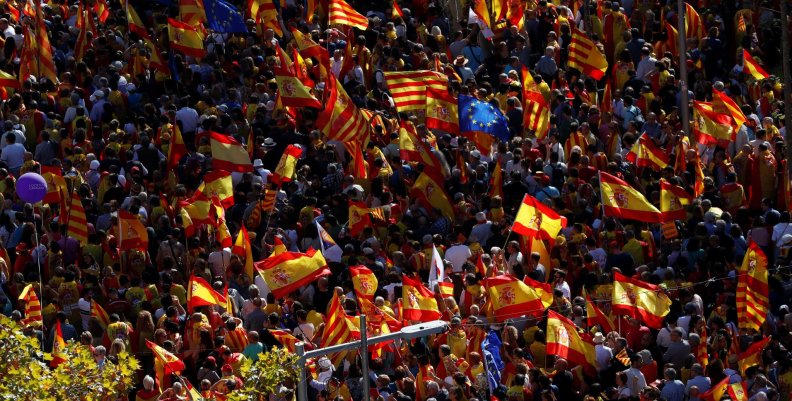 Pro-unity supporters take part in a demonstration in central Barcelona Pro-unity supporters take part in a demonstration in central Barcelona