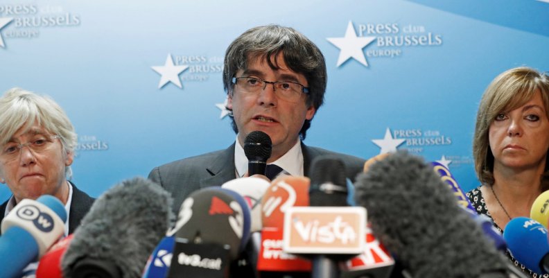 Sacked Catalan leader Carles Puigdemont and former members of the Government of Catalonia Clara Ponsati and Meritxell Borras attend a news conference in Brussels Sacked Catalan leader Carles Puigdemont and former members of the Government of Catalonia Clara Ponsati and Meritxell Borras attend a news conference in Brussels