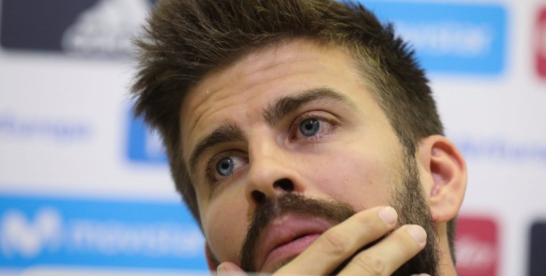 Spain's national soccer team player Gerard Pique gestures during a news conference at the training grounds in Las Rozas, outside Madrid Spain's national soccer team player Gerard Pique gestures during a news conference at the training grounds in Las Rozas, outside Madrid