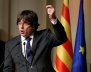 Former Catalan leader Carles Puigdemont gestures during a meeting with Catalan mayors in Brussels
