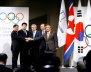 IOC President Thomas Bach poses with the National Olympic Committee of the Republic of Korea and the NOC of the Democratic People’s Republic of Korea, at the Olympic Museum in Lausanne