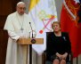 Pope Francis speaks next to Chile's President Michelle Bachelet at the La Moneda Presidential Palace in Santiago,