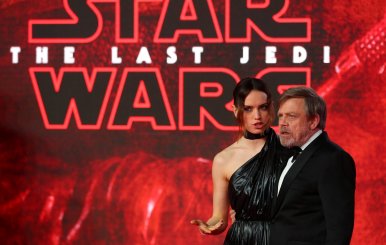 FILE PHOTO: Actors Daisy Ridley and Mark Hamill pose for photographers as they arrive for the European Premiere of 'Star Wars: The Last Jedi', at the Royal Albert Hall in central London