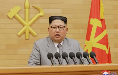 FILE PHOTO: KCNA picture of North Korea's leader Kim Jong Un speaking during a New Year's Day speech