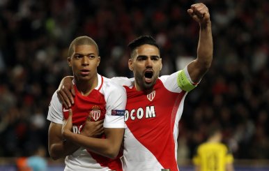 Monaco's Kylian Mbappe-Lottin celebrates scoring their first goal with Radamel Falcao