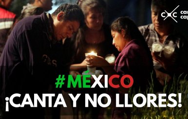 People light candles for victims who died after the roof of a church collapsed, after an earthquake hit Atzala, on the outskirts of Puebla