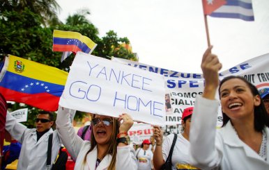 People shout slogans during a march to express support for Venezuela in Havana, Cuba